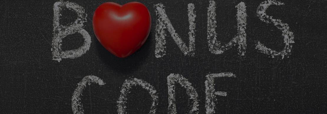 An image of a blackboard with the words ‘Bonus Code’ written in white chalk. A red heart symbol replaces the letter o in bonus.