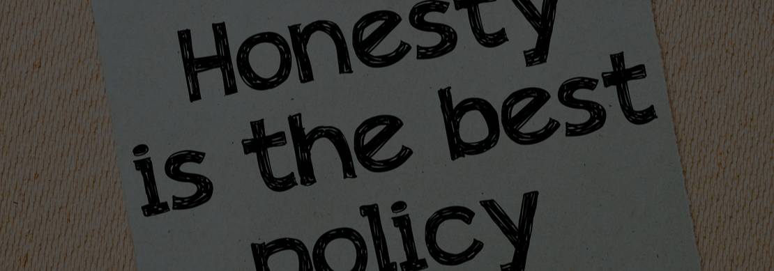 Honesty is the Best Policy written on a note and tacked to the wall