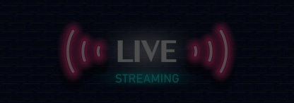 A live streaming sign on a dark brick wall background