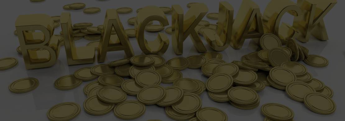 the word Blackjack in golden letters with golden casino coins all around